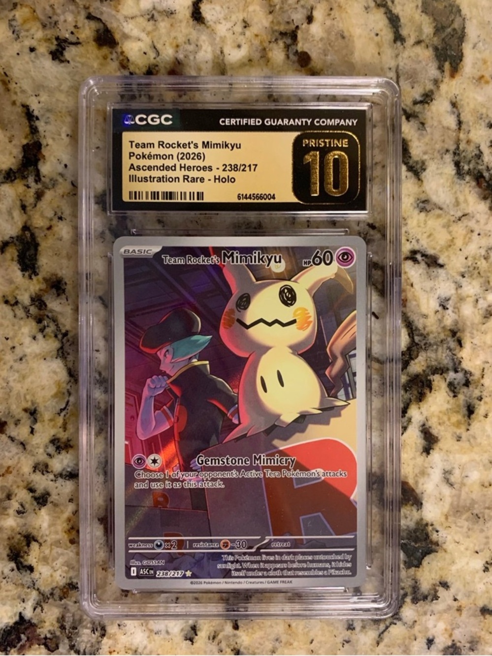 Pokémon Team Rocket's Mimikyu Holo Card - Pristine 10 Graded